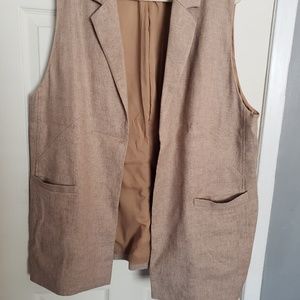 Tweed sleeveless blazer
